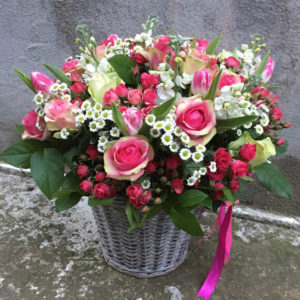 Basket of roses and chrysanthemums